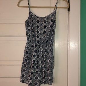 White/Blue Romper. Crossed back/Adjustable straps